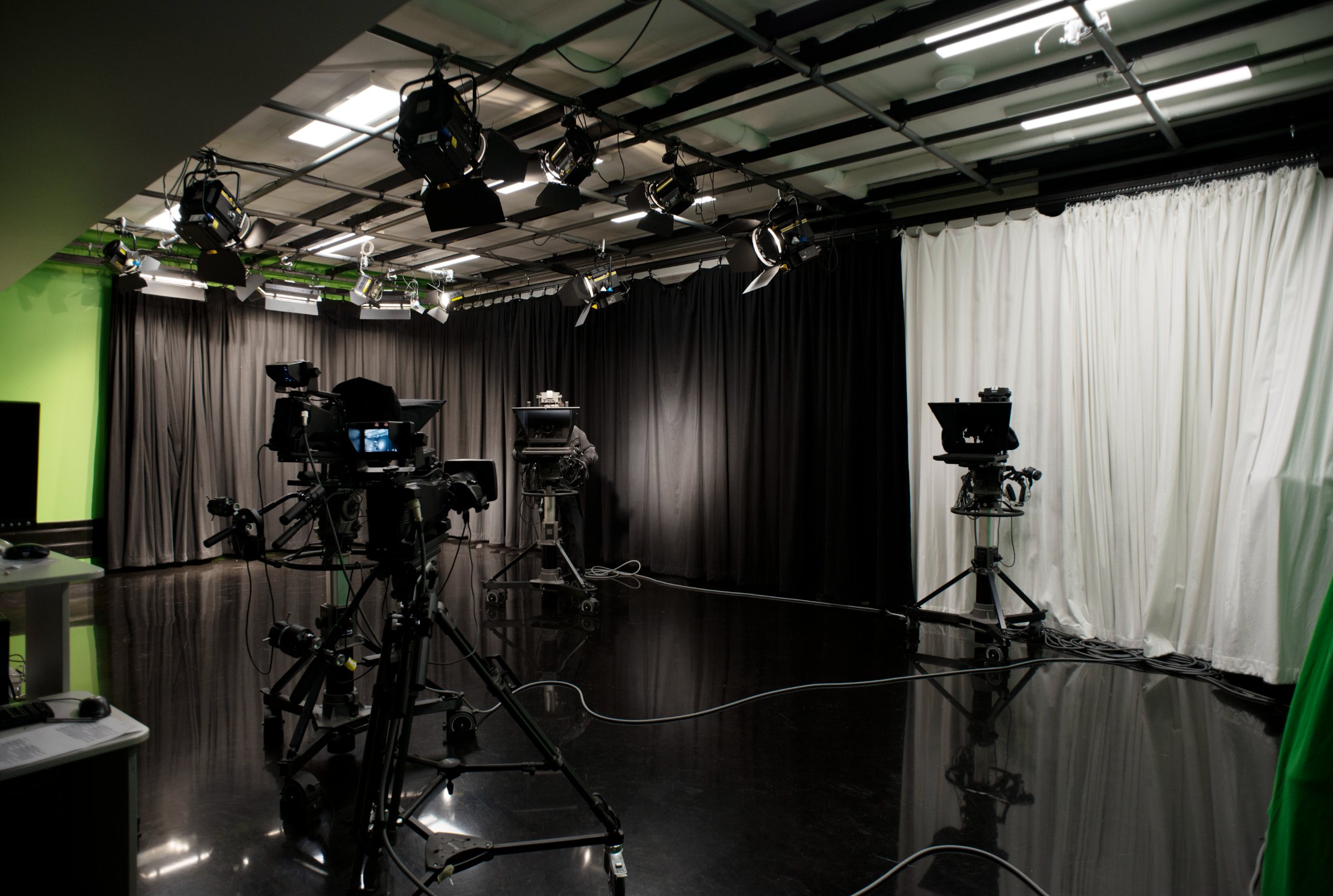 RMIT media and broadcast studio — cameras, teleprompters and lighting rig on the studio floor